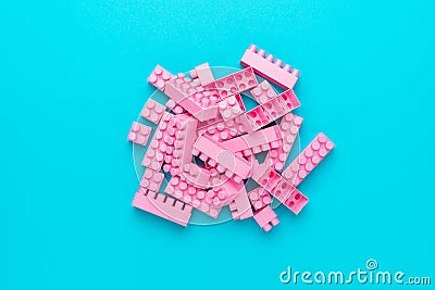 Minimalist flat lay photo of pink plastic blocks with copy space Stock Photo