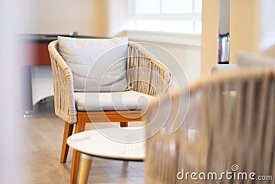 A minimalist gray soft chair in a space to relax on a casual day Stock Photo