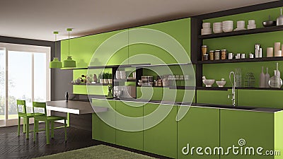 Minimalist modern kitchen with wooden details, table and chairs, green interior design Stock Photo