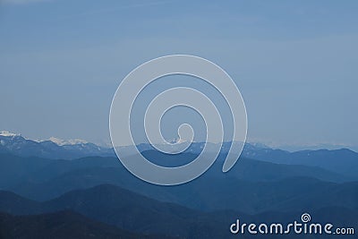 Minimalistic landscape , no people. View of snowy peak of Mount Fisht from afar. Main Caucasian ridge in reserve Stock Photo