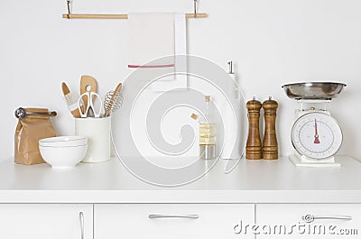 Minimalistic modern kitchen in pastel colors with kitchenware and space Stock Photo