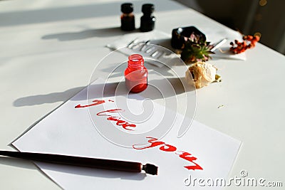 Nice calligraphic card with red inscription I love you on white Stock Photo