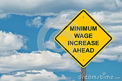 Minimum Wage Increase Ahead Warning Sign Stock Photo