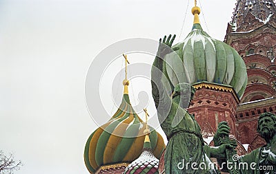 Minin and Pozharsky monument and famous Saint Basil`s Cathedral on Red Square, Moscow, Russia. Retro capture on film Stock Photo