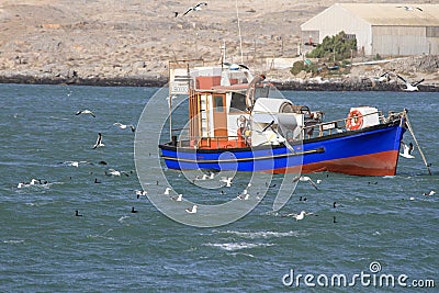 Mining boat at anchor, Luderitz harbour Stock Photo