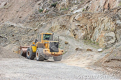 Mining excavator in stone pit Stock Photo