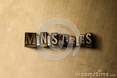 MINISTRIES - close-up of grungy vintage typeset word on metal backdrop Cartoon Illustration