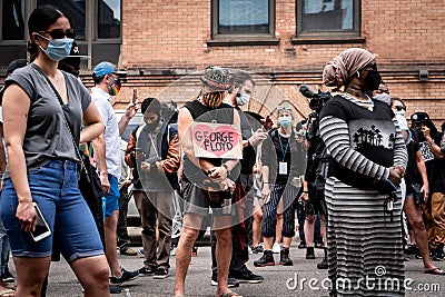 Black Lives Matter protestors gather in prayer for George Floyd Family Memorial Service after Minneapolis riots Editorial Stock Photo