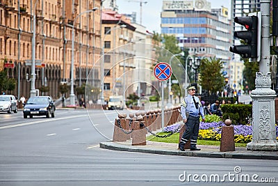 Minsk, Belarus - August 22, 2011 - A policeman works on Independence Avenue on the day of the protests Editorial Stock Photo