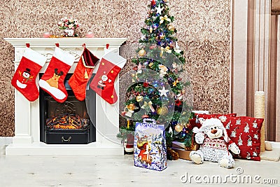 Minsk, Belarus, 11.12.2018: Beautiful holdiay decorated room with Christmas tree with presents under it. Editorial Stock Photo