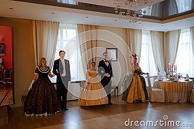 MINSK, BELARUS - FEBRUAR 1, 2018: beautiful couples on a secular Editorial Stock Photo