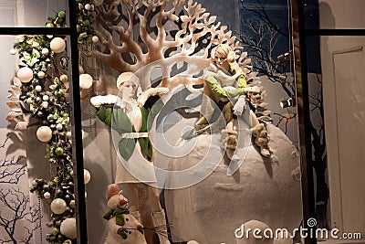 MINSK, BELARUS - JANUARY 08, 2014: Boutique fashion mannequins with Christmas decoration. Editorial Stock Photo