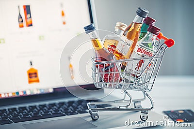 Minsk, Belarus - January 16, 2018: mini shopping cart full of alcohol bottles Editorial Stock Photo