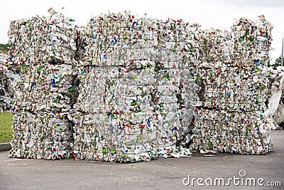 Minsk, Belarus -June 6, 2019Pile of pressed white plastic bottles at a garbage collection plant Editorial Stock Photo