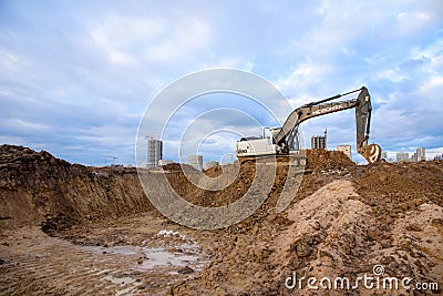 Excavator Hidromek HMK 220 LC working at construction site. Construction machinery for excavation, Editorial Stock Photo