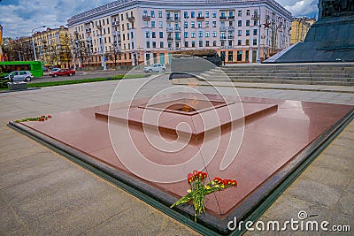 MINSK, BELARUS - MAY 01, 2018: Close up of the base and eternal flame in monument in honor of victory of Soviet army Editorial Stock Photo