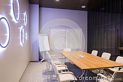 Minsk, Belarus - May 23, 2019: Interior of empty modern board room at creative office Editorial Stock Photo