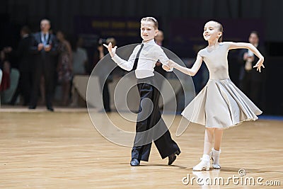 MINSK-BELARUS, MAY,19: Unidentified Dance couple performs Juvenile-1 Latin-American program on World Open Editorial Stock Photo