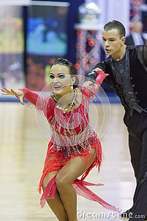 Minsk-Belarus, October 4,2014: Unidentified Professional dance couple performs Adult Latin-American program on World Open Editorial Stock Photo