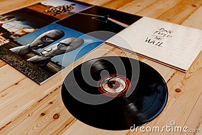 Minsk, Belarus - 07.04.2020: Pink Floyd Vinyl Collection on wooden background Editorial Stock Photo