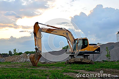 Wheel Excavator HYUNDAI R210W-9S at a construction site Editorial Stock Photo