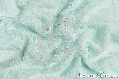 Mint or green guipure with roses. Crumpled or wavy fabric texture background. Abstract linen cloth soft waves. Natural Stock Photo