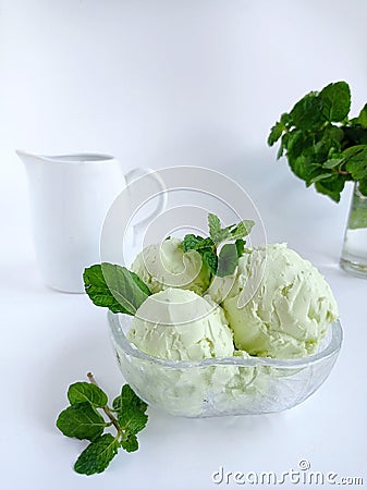 Mint ice cream in glass bowl bright mood stilllife Stock Photo