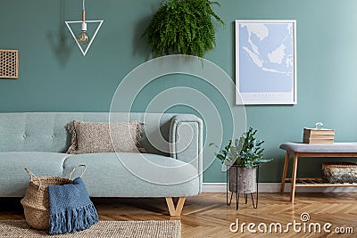 Mint sofa in stylish and cosy living room. Stock Photo