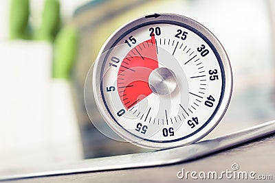 20 Minutes - Analog Kitchen Timer On A Cooktop Stock Photo