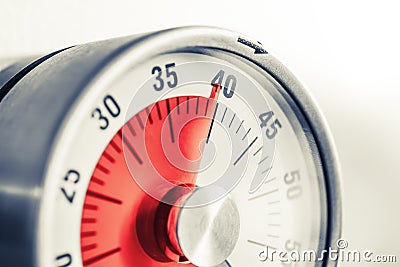 40 Minutes - Analog Kitchen Timer With Red Mark Placed On A Fridge In Monochrome Colors Stock Photo