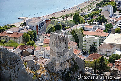 Mirabela Fortress (Peovica) in Omis, Croatia. Ruins of a hilltop fortress with views of the sea and the old town Stock Photo