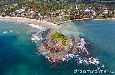Mirissa sandy Parrot Rock island landmark aerial photo with a beautiful bay in Matara District on Sri Lanka. Exotic Asian Stock Photo