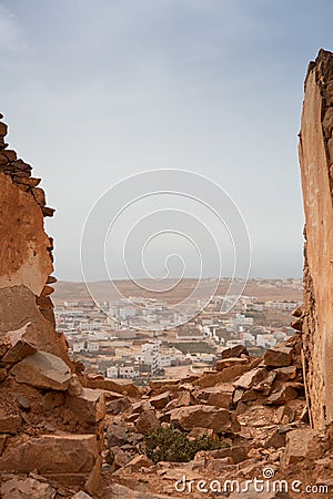 Mirleft through a broken wall of old colonial fort Stock Photo