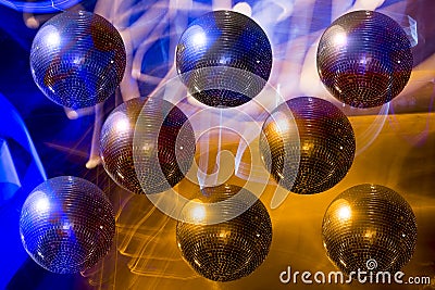 Mirror ball disco on the background-color illumination Stock Photo