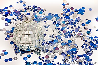 Mirror discoball with blue confetti Stock Photo