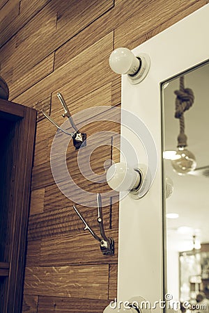 Mirror and wall coat rack Stock Photo