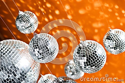 Mirrored disco balls with light spots Stock Photo