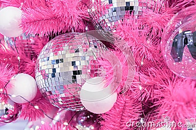 Mirrored disco balls on a pink Christmas tree Stock Photo