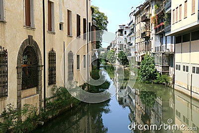 Mirroring houses in canal of Padua, Italy Stock Photo