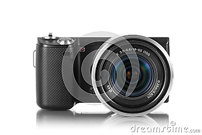 Mirrorless camera with lens Stock Photo