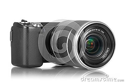 Mirrorless camera with lens Stock Photo