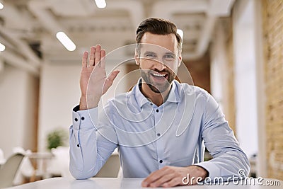 Mirthful HR director welcoming new employee to the team Stock Photo