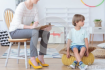 Misbehaving boy and counselor Stock Photo
