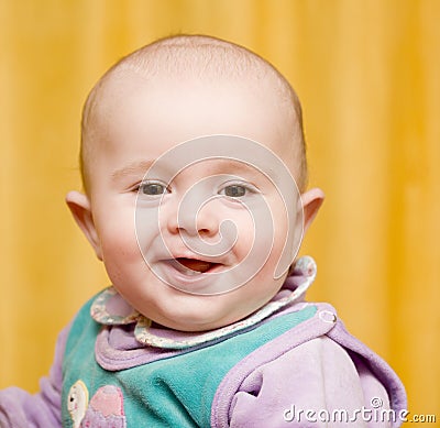 A mischievous baby Stock Photo