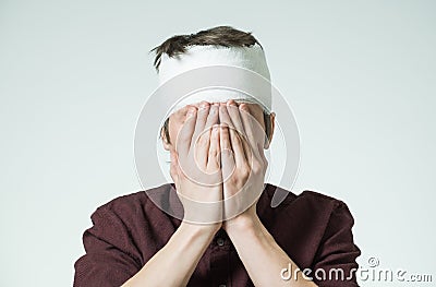 Man with bandage on his head Stock Photo