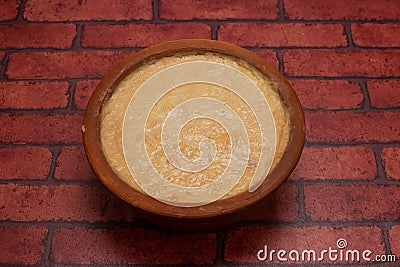 Mishti Doi or sweet yogurt served in plate isolated on background top view of bangladeshi dessert food Stock Photo