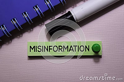 Misinformation text on sticky notes isolated on office desk Stock Photo