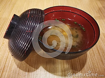 Miso soup on the wooden table. Stock Photo