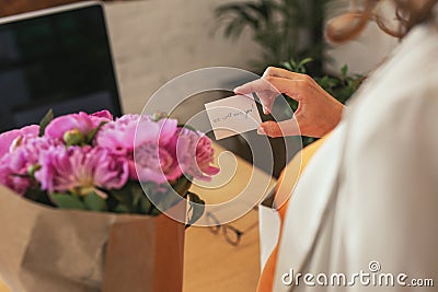 Tender female hands holding present card Stock Photo