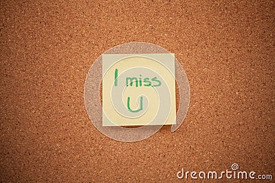 Miss you note on cork board Stock Photo